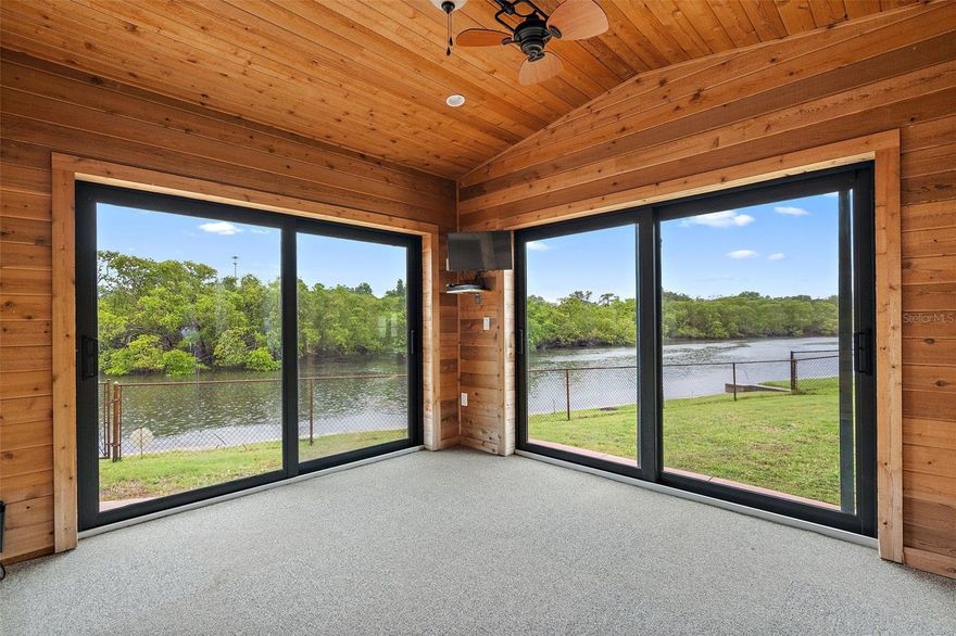 One or more photo(s) has been virtually staged. … If these walls could talk, they’d tell the story of an owner-engineer / builder who carefully crafted and over-engineered this home over the past 35 years, creating a true Self-Contained, family, waterfront resort-estate … with Airbnb another Potential use …. Presenting this 7,500+ total sq ft Self contained Resort Home / Estate … on nearly ¾ acre of TIDAL waterfront with 130’ of Water-Frontage with POOL and DOCK (2023) …  5BR / 4BA in total … including a Private IN-LAW APARTMENT (with private entrance, kitchenette & full bath) … ALSO IDEAL for Multi-Generational Living … The main home features a BRAND-NEW KITCHEN and a generous ($20,000) appliance allowance …  soaring family room … formal dining room with butler’s pantry …  and a 25 x 38 library … Additional spaces include billiards/game room …solarium … 2 home gym spaces … 4-Car CEDAR LINED (tandem) GARAGE plus adj workshop …. ABUNDANT storage ...effective year built is 1995, per Co. Prop Appraiser who rates the Structural Elements Quality as EXCELLENT … Other UPDATES INCLUDE: Roof 2020 … solar power added 2022 … impact doors/windows THROUGHOUT … 2 brand-new A/Cs being installed Sept. 2025 ... BONUS: assumable $250,000 flood policy at just $3,300/yr…. Tidal, waterfront living - perfect for kayakers, fishermen, some boaters and all nature lovers—manatee and dolphins often visit! … Priced almost $80,000k BELOW County Prop Appraisers Sales Comparison Value ... LOCATION In UNincorporated Pinellas Co keeps TAXES LOW and should allow for an Airbnb-type use, if buyer is so inclined ...  Flexible and realistic Owners will consider all reasonable offers—HURRY! … you do not want to miss this great Value for Money opportunity!