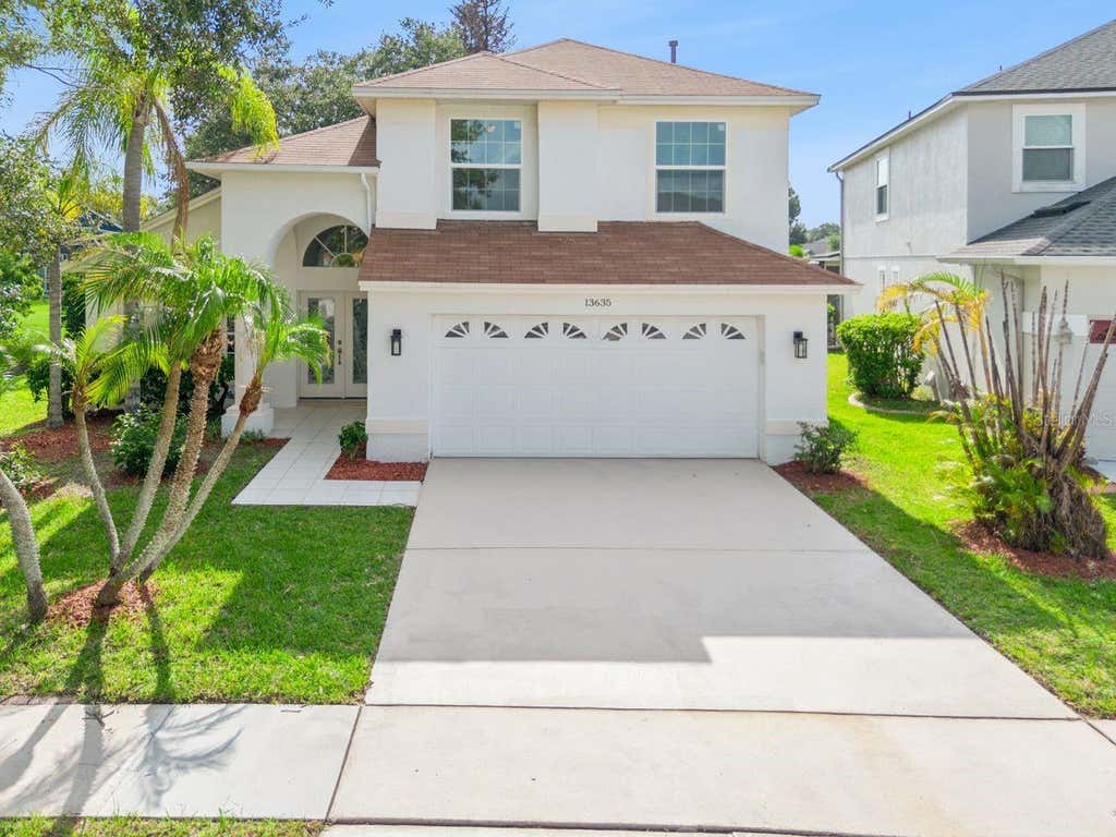 Photo of 13635 Waterhouse Way, Orlando, FL 32828 (MLS # O6436254)