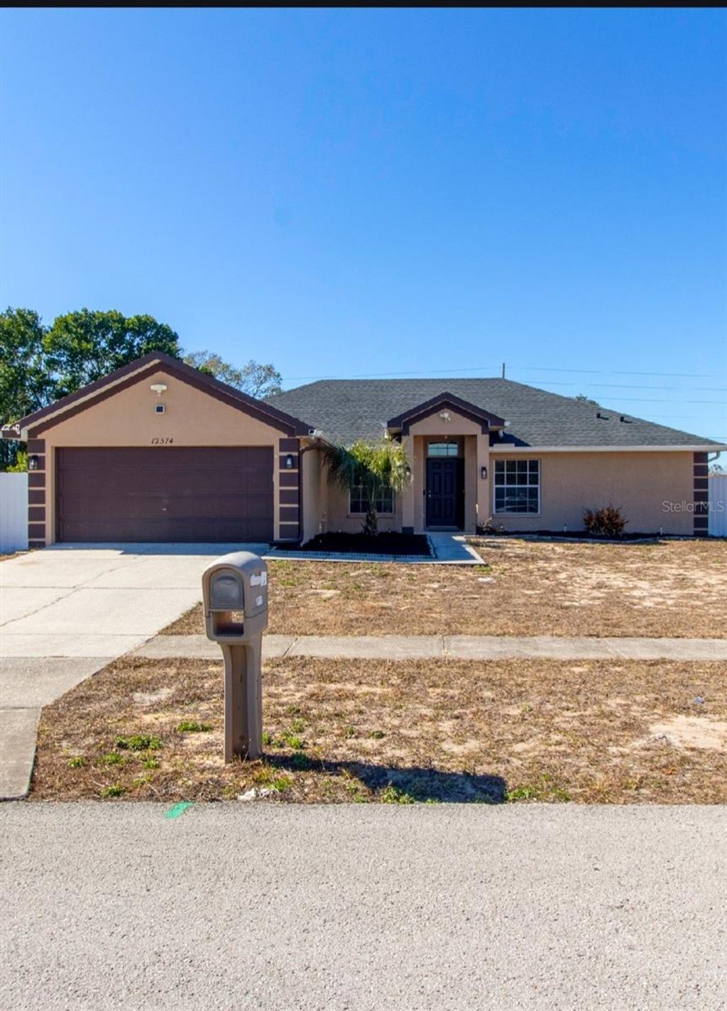 Photo of 12374 Corrine Ave, Spring Hill, FL 34609 (MLS # TB8466929)