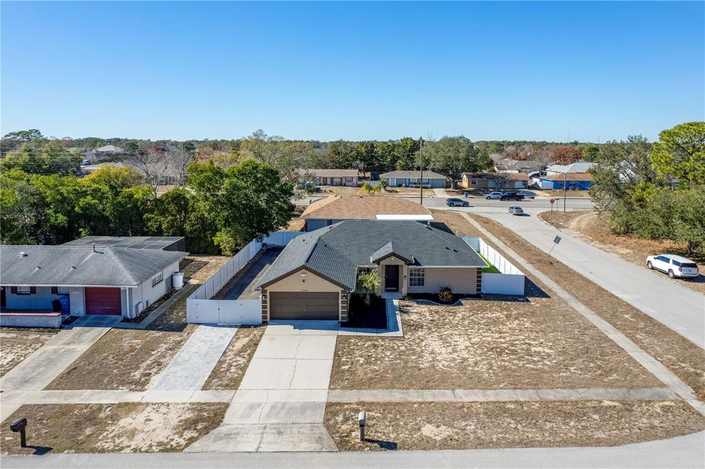 Photo of 12374 Corrine Ave, Spring Hill, FL 34609 (MLS # TB8466929)