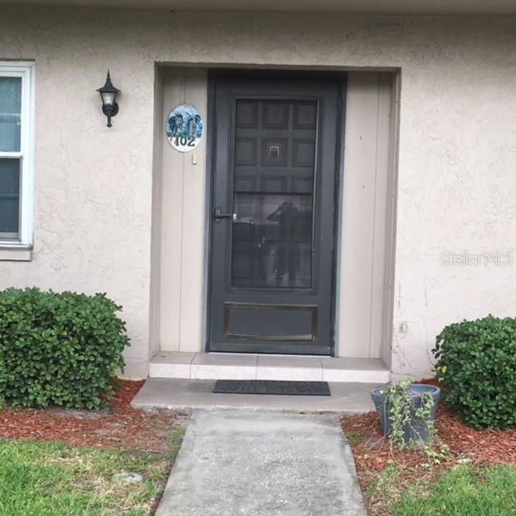 Photo of 8693 Bardmoor Boulevard #102B, Seminole, FL 33777 (MLS # TB8436987)