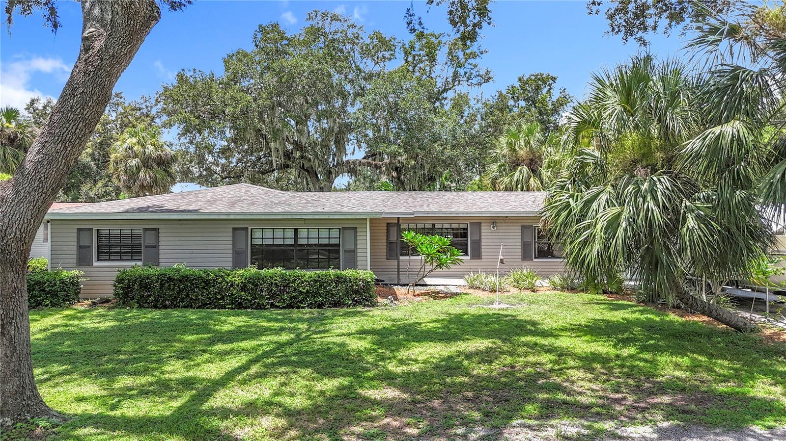 Acreage, in-law suite, private pond, NO HOA! What else do you want? This beautiful 3-bedroom 2 bath home sits on 3.1 acres, has big rooms, brand new Luxury Vinyl flooring, an office, 1 car garage & an attached carport. Couple that with a 625 sq ft, 1 bedroom, 1 full bath, nice big kitchen, detached in-law suite, that could be a rental unit also. Don't forget about your own private fishing pond. You can be in your own world, nice & quiet, grow your own food, catch some fish & let the world go by. There is plenty of room to store some grown up toys, have a nice big garden, work in the barn/shed, park the RV & still have room for the kids to ride their toys. There is a long private drive to the property that keeps you away from the typical noisy environment. NO HOA or CDD, of course. Close enough to I-4 for an easy commute to Tampa or Orlando. Come out and see this layout & fall in love with the peace & quiet!