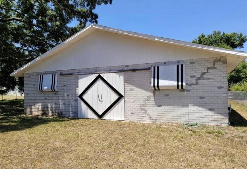 Photo of 1910 Lithia Pinecrest Road, Valrico, FL 33596 (MLS # TB8498669)