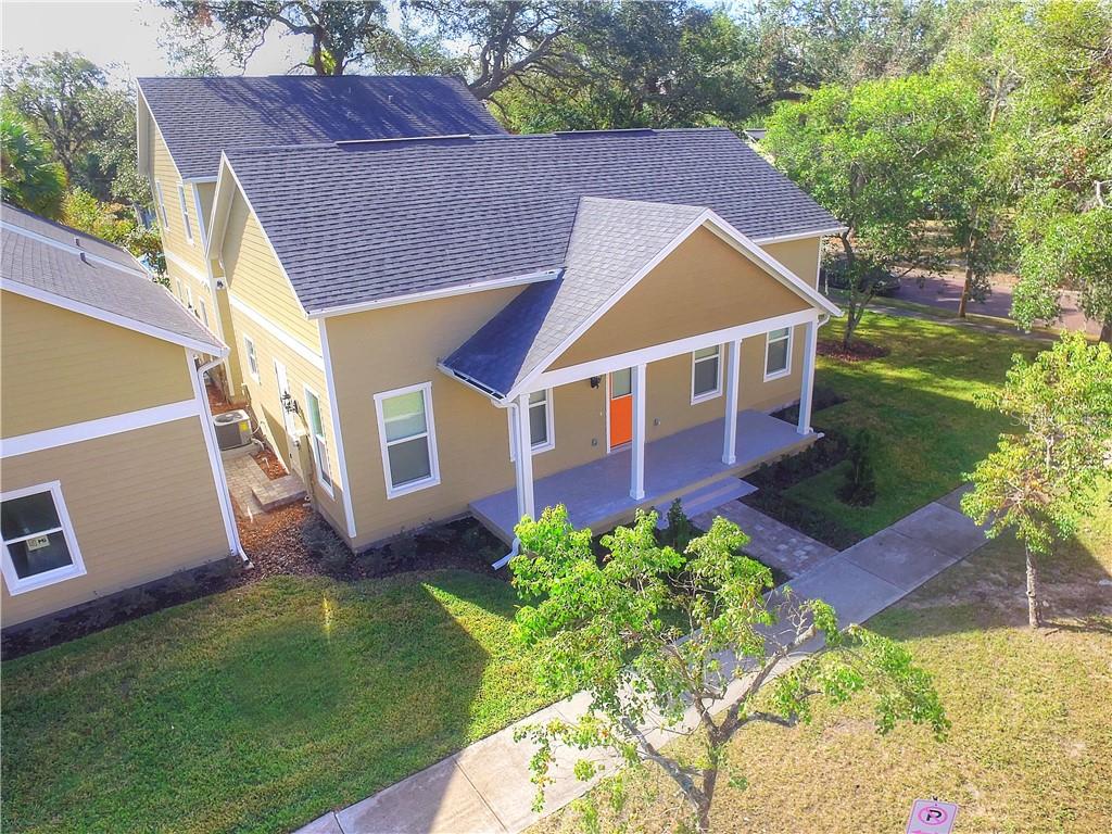 Spacious three bedroom two bath with detached two car garage in the heart of Thornton Park! Walk to restaurants, bars and Lake Eola. This well appointed half duplex has three bedrooms, two baths and open modern floor plan, no carpet, tile throughout. All appliances including washer and dryer. Detached 2 car garage. Lawn care included. Must See!