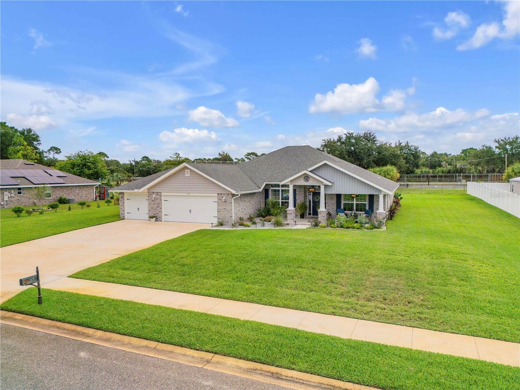 Photo of 215 Lagoon Mist Court, Oak Hill, FL 32759 (MLS # O6448257)