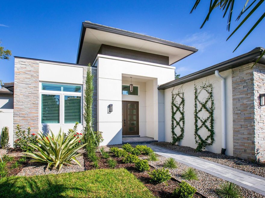 Brand New Fully Furnished Model~ Close and builder will lease back until June of 2024. The brilliant professionals at AlLLEGRA HOMES have yet again masterfully designed and expertly crafted their newest 2023 MODEL that’s fresh, modern, and sophisticated. Nearby Southside Village and top ranked schools, this casual yet elegant home is located in one of the most coveted areas in Sarasota and is sure to deliver a delightful lifestyle with plenty of room to live life to the fullest. The artistic details throughout this 3,183 square foot luxury residence are spectacular and beautifully complement the atmosphere this home presents. The features of the family room are handsome and include built-in glass wine storage rack with recessed lighting, eye-catching ceiling detail with an amazing chandelier, Dimplex fireplace with floating shelves on either side and wood floors. The kitchen is impressively equipped with a large island with waterfall edge, lengthy under-cabinet window, SubZero refrigerator, Wolf gas cooktop, Wolf oven and drop-down microwave, Cove dishwasher, and pantry with built-in shelving. Adjacent to the kitchen is a dining room with built-in buffet, floating shelves and LED tape light. Enjoy the stunning gas heated pool year-round with 8” raised spa, sun shelf, fountain bubbler, 2 LED water bowls, and additional seating area with outdoor gas fireplace and access to the nearby pool bath. A wet bar and built-ins are featured in the bonus room with disappearing sliders opening on 2 sides to the summer kitchen with beverage center and Coyote gas grill. The incredibly large shellock lanai is enclosed in Clearview screen and surrounded in lush designer landscaping and privacy fencing. The owner’s suite features an enormous 120-square-foot walk-in closet with built-ins, direct access to the laundry facilities, and a very spacious and lavish bath creates a spa-like experience with separate vanities, a designer garden tub, a 2-person zero threshold shower, floating mirrors, private water closet and access to an outdoor shower and cabana ½ bath off the pool area. Adding to the artistry of the owner’s suite is the striking ceiling detail with 4 built down boxes and light rail. Two other bedrooms are en suite with walk-in closets. Additional amenities: Study with built-ins, oversized 3 car garage with epoxy floor, central vac, alarm system for pool and home security, Trane 18 SEER 4 ton 2-stage heat pump, hurricane impact Low-e glass windows, cove crown molding throughout, Rheem gas tankless water heater, and tray ceilings in bonus room, foyer and owner’s suite. Also included are speakers on the lanai and in the bonus room, family room, study and owner’s suite. Brand new with all the bells and whistles you’d expect in a gorgeous luxury home…what more could you ask for? Subject to lease-back to builder.