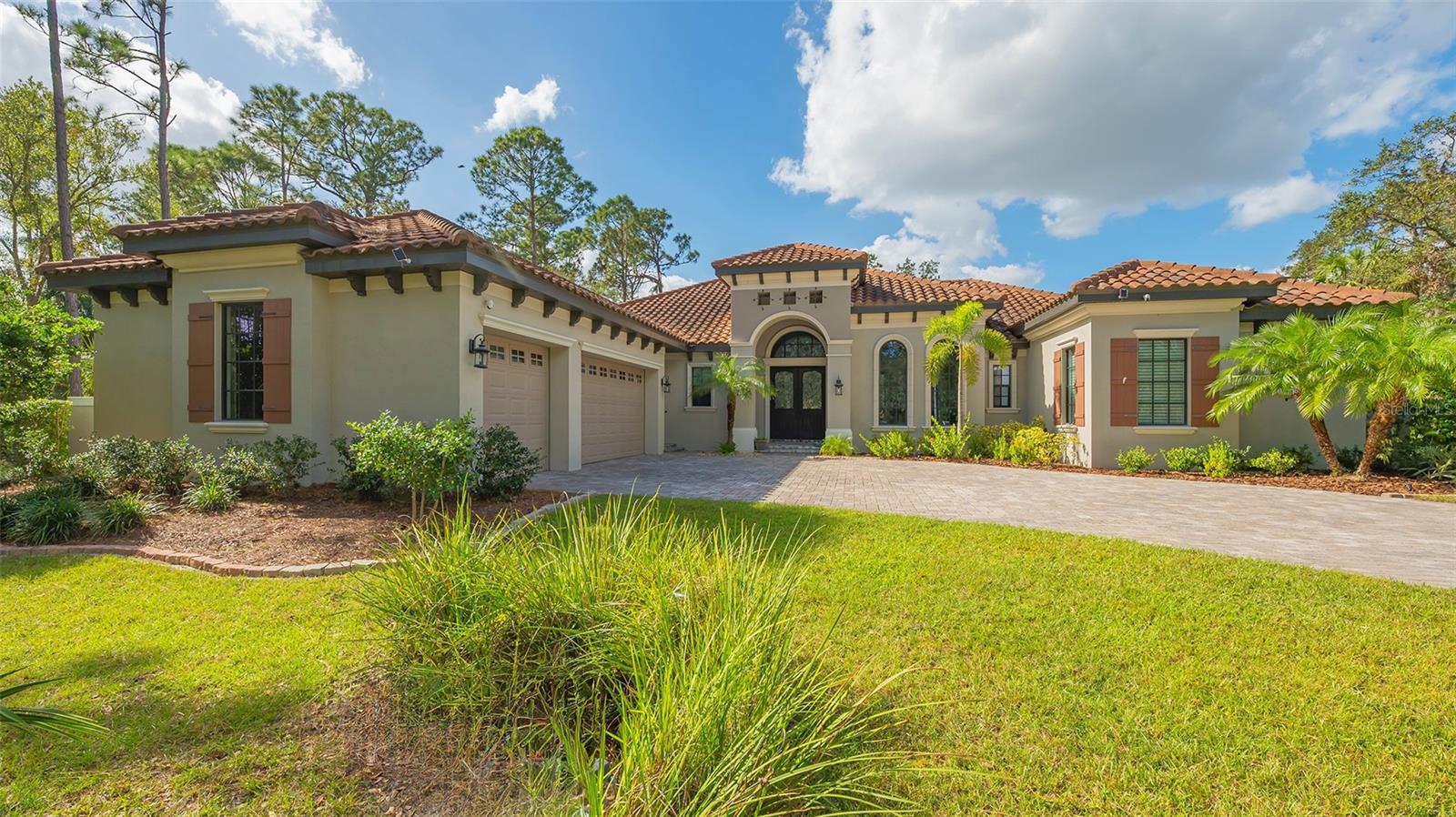 Welcome to 9291 Swaying Branch Road — a luxurious private retreat nestled within The Forest at Hi Hat Ranch. This exclusive 270-acre gated community in the heart of Sarasota, FL, features just 54 custom-designed homes, each uniquely crafted with no architectural repeats, creating a truly distinctive and personalized living experience.
Set on a sprawling 5.95-acre lot, this single-story masterpiece offers the perfect blend of elegance, privacy, and functionality. Inside, you'll find three spacious bedrooms, each with its own en suite bathroom, ensuring comfort and privacy for family and guests alike. The thoughtfully designed floor plan also includes two dedicated studies—an ideal setup for families with multiple family members working from home, offering separate, quiet spaces for productivity.
A versatile bonus room provides endless possibilities—it can easily transform into a game room, home theater, gym, or even an additional bedroom, adapting effortlessly to your lifestyle needs.
Step outside and discover your own private outdoor oasis. The saltwater pool is not only a refreshing escape, but also a very private retreat, surrounded by lush landscaping and expansive patio space. Entertain with ease at the gourmet outdoor kitchen, gather around the fire pit, or unwind under the covered lanai and enjoy the peaceful surroundings.
Built to the latest hurricane codes, the home features hurricane-impact windows throughout for peace of mind. Foam insulation in the attic ensures year-round energy efficiency. The home also includes a whole-home water system with reverse osmosis in the kitchen for pristine water quality.
Culinary enthusiasts will fall in love with the chef's kitchen, featuring top-of-the-line appliances including a Sub-Zero refrigerator, Miele range and oven, and a wet bar with wine fridge—perfect for entertaining in style.
Located in a quiet, secure community just minutes from top-rated schools, upscale shopping, fine dining, and the vibrant cultural scene of downtown Sarasota, this home truly offers the best of luxury living.
9291 Swaying Branch Road is more than just a home—it's a lifestyle. Schedule your private showing today and experience the elegance, functionality, and tranquility of this Sarasota estate firsthand