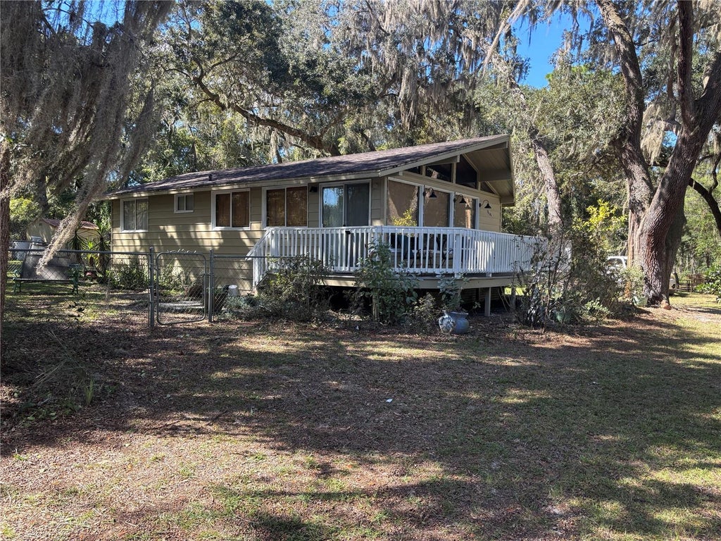 Photo of 5870 SE 166th Court, Ocklawaha, FL 32179 (MLS # OM734760)