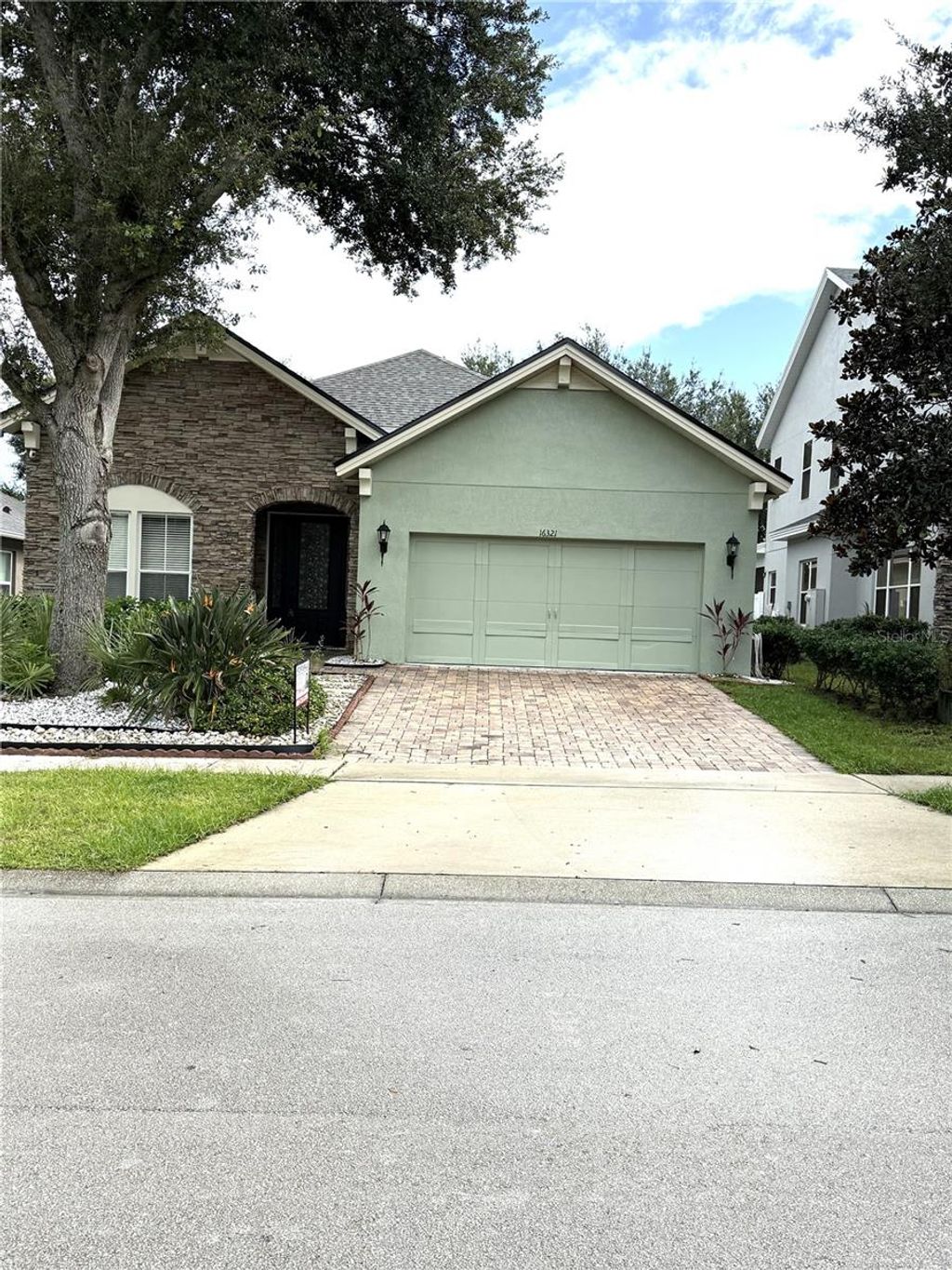 Photo of 16321 Saint Augustine Street, Clermont, FL 34714 (MLS # O6346190)