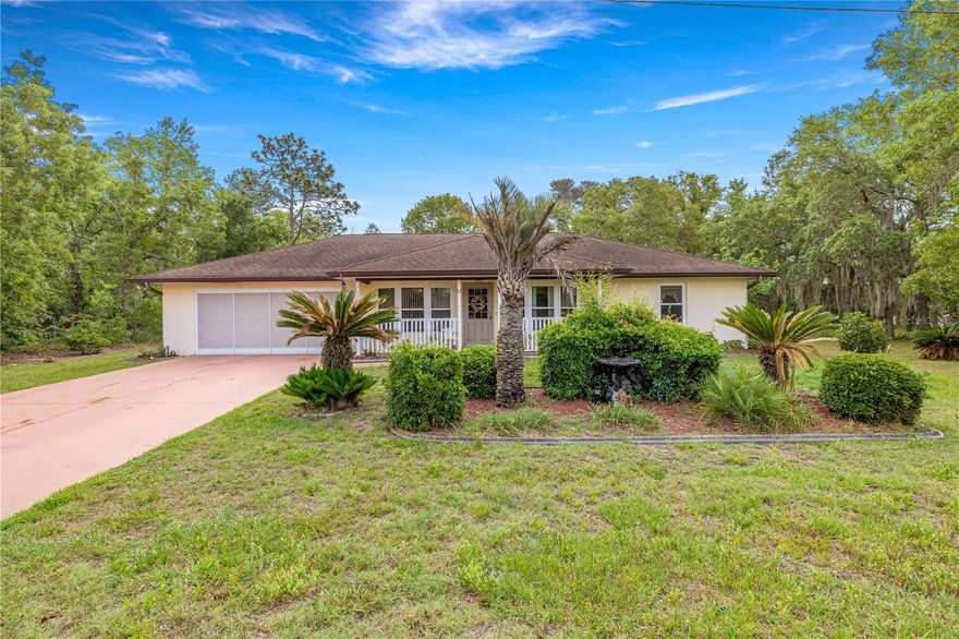 POOL HOME ON 1.26 ACRES! Nestled on a spacious double corner lot, this 3-bedroom, 2-bath home offers the perfect blend of privacy, comfort, and room to spread out. The newly resurfaced pool is the centerpiece of the outdoor living space, surrounded by a large screened lanai that's ideal for entertaining, relaxing, or enjoying Florida's beautiful weather year-round.

Inside, you'll find a warm and inviting living room anchored by a wood-burning fireplace, creating the perfect gathering space. The oversized galley-style kitchen overlooks the main living area, making it easy to stay connected while cooking or hosting guests. All three bedrooms offer generous space, while the glass-enclosed Florida room provides additional flexible living space that can be used as a home office, game room, or sitting area.

With 1.26 acres, a double corner lot, a resurfaced pool, and plenty of indoor and outdoor living space, this property offers a rare opportunity to enjoy the Florida lifestyle with room to grow.