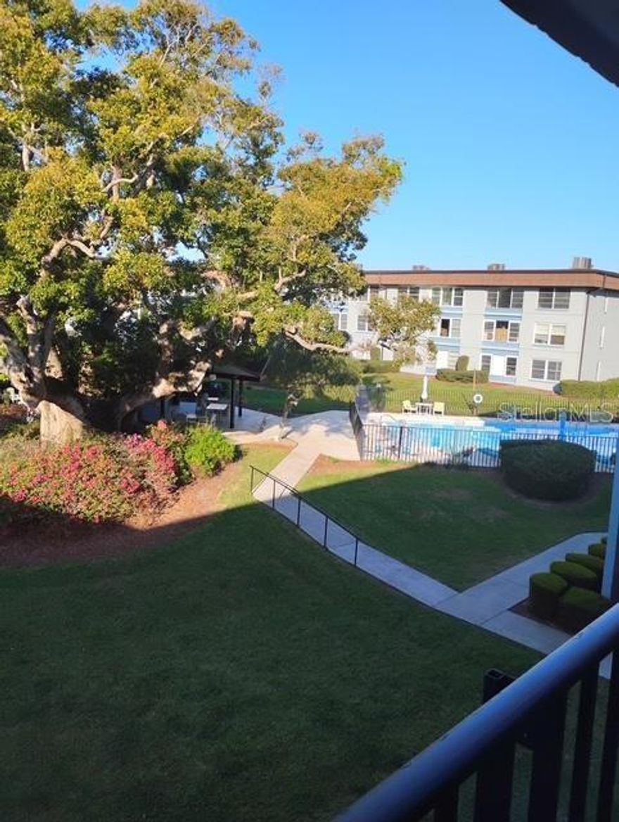 Cozy 2 bedroom 2 bath home with great view of Lake Howard off the master bedroom and patio. Turn around and look out of the front door with a beautiful view of the pool and patio areas.  Rood is new this year with all damage from last year's storm repaired.  This home is in move-in condition.