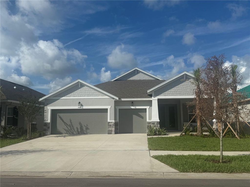 Photo of 17386 Crisp Apple Lane, Land O Lakes, FL 34638 (MLS # J991638)