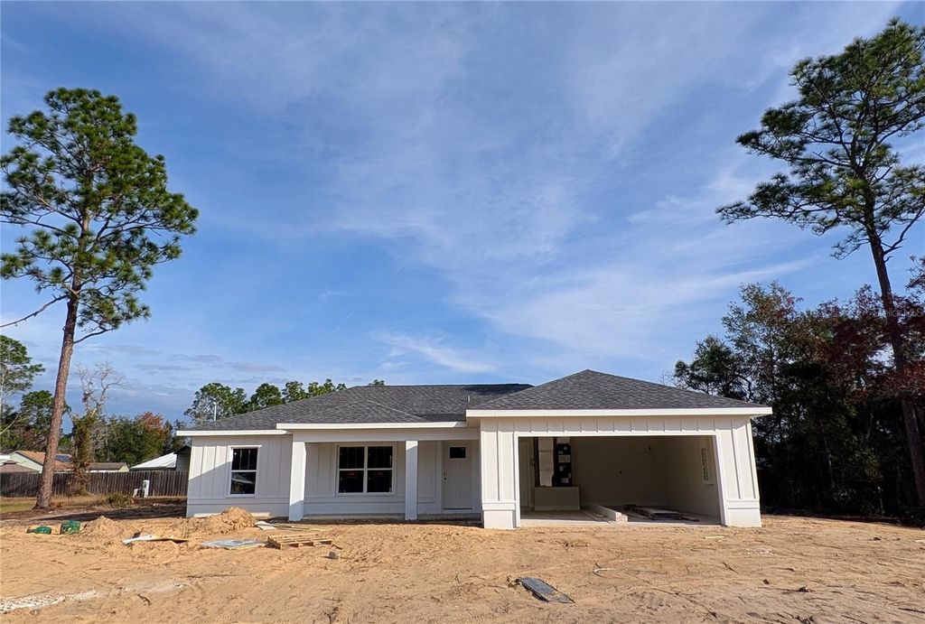 Photo of 7217 Hemlock Loop, Ocala, FL 34472 (MLS # O6372881)