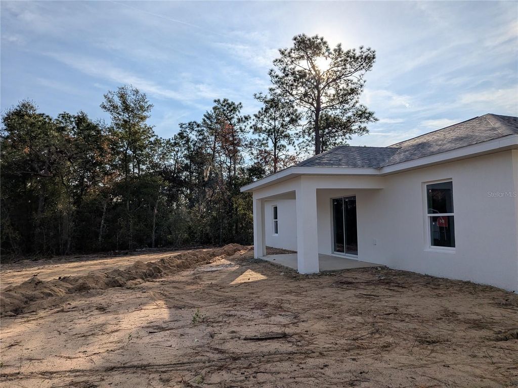 Photo of 7217 Hemlock Loop, Ocala, FL 34472 (MLS # O6372881)