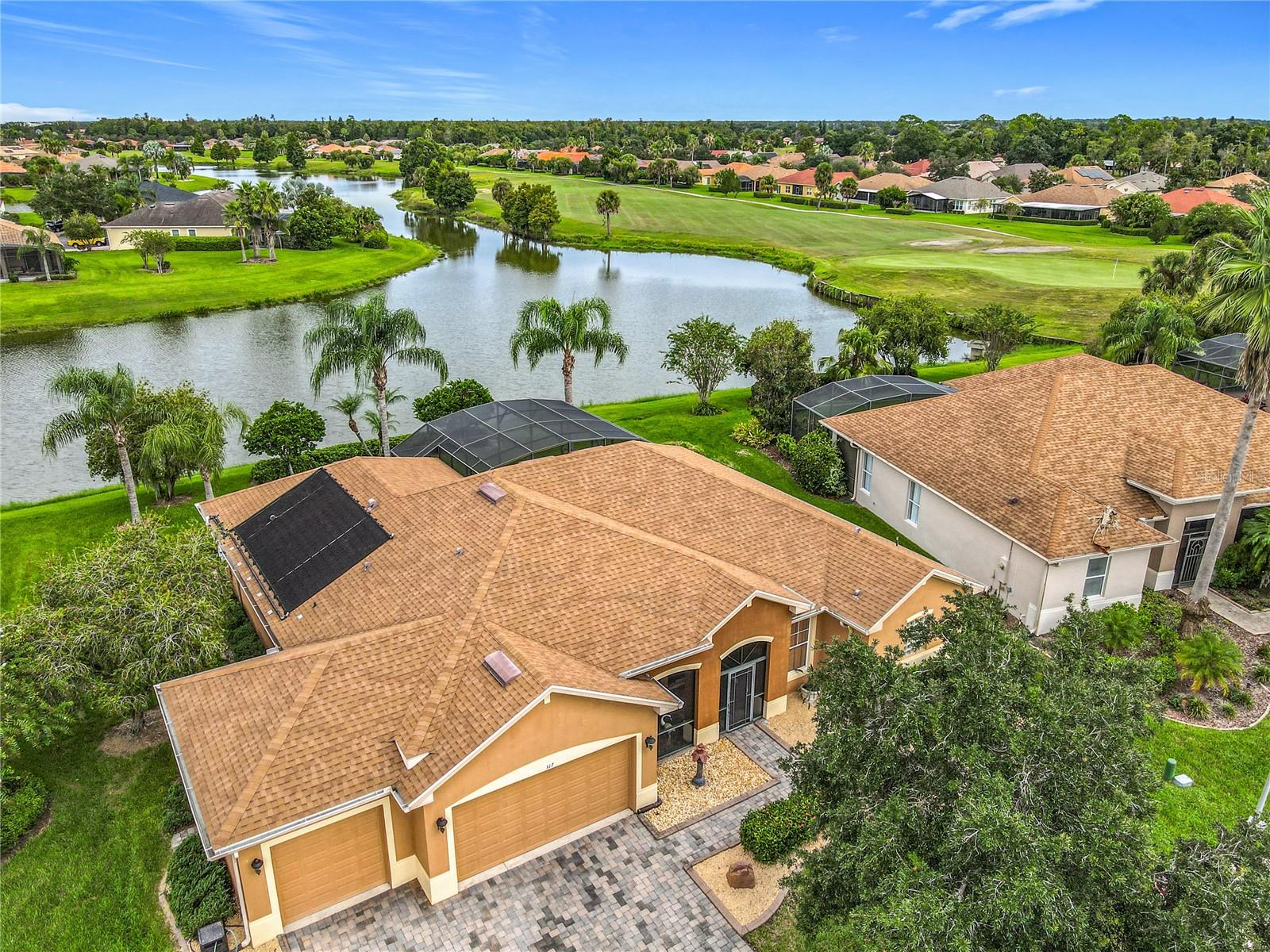 ABSOLUTELY STUNNING Operetta model with a SALT WATER POOL on a POND with $$ MILLION $$ WATER & GOLF COURSE views in the Bella Viana subdivision of Solivita. THREE CAR GARAGE! HVAC new 2019. Roof new 2016. 50 gallon Water Heater NEW 2016. Great Curb appeal with Landscape Curbing surrounding the front flower beds. Stones w/ some fresh plantings in the flower beds. Front entryway is screened. 8' doors, 5.5" BASEBOARDS, ROUNDED CORNERS, DOUBLE PANE WINDOWS & SLIDERS throughout. Extensive CROWN MOLDING. Custom CLOSET ORGANIZERS in bedrooms. 20" CERAMIC TILE ON THE DIAGONAL in all main living areas with LAMINATE in bedrooms (NO CARPET). Kitchen features QUARTZ counters, 42" upper cabinets with Crown Molding, several GLASS WINDOWS & a WINE RACK, pull-out drawers in lower cabinets, a moveable ISLAND w/ GRANITE counter, 2 SKYLIGHTS, STAINLESS STEEL APPLIANCES including a SLIDE-IN RANGE, pantry w/ custom doors matching the cabinetry & pull-out drawers and RECESSED & UNDER CABINET lights. BREAKFAST BAR. FLORIDA ROOM has excellent views of WATER. Primary Bedroom has 2 WALK IN CLOSETS. The bathroom boasts DUAL sinks, QUARTZ counters, LARGE WALK-IN *ACCESSIBLE* SHOWER & Glass Block windows. Second Bathroom has QUARTZ counter and a tub w/ shower. Powder Room has Corian counters. LARGE *Custom* LAUNDRY ROOM has Corian Counters, a wash basin & built-in cabinets. Shown Washer & Dryer do not convey but will be replaced w/ another W/D. Garage includes two overhead storage racks & is PLUMBED for WATER SOFTENER. Garage floor is painted with Epoxy & Confetti Chips. Outdoor living to it's finest with HUGE LANAI & POOL deck which is EXTENDED & SCREENED. LARGE 13' X 25" Pool has a SALT System, is SELF CLEANING & heated by SOLAR PANELS. Exclusions include drapes in Florida Room & Primary Bedroom. **See the FULL LENGTH VIDEO on Tour Link 1.** ***Solivita is an active adult 55+ community located in Kissimmee, Florida. It is approximately 50 minutes from Disney World & the Orlando International Airport. Solivita has a total of 5,470 homes. Approximately 10,000 - 11,000 people live in Solivita during the winter while approximately 7,500 live in Solivita during the summer. Enjoy your active years in this piece of paradise. Solivita's amenities include: - a manicured SOFTBALL diamond & field - 36 holes of CHAMPIONSHIP GOLF that can be played by joining the Stonegate Golf Club or paying as you go - 2 STATE of the Art AMENITY centers with updated exercise equipment, yoga studio & meeting rooms - 3 restaurants - 14 HEATED POOLS - 17 PICKLEBALL courts - 9 TENNIS courts - 4 BOCCE BALL courts - 4 SHUFFLEBOARD courts - 3 HORSESHOE pits - a BILLIARDS room - miles of bike paths - 2 DOG PARKS (Small & Large Dogs) - Corn Hole - Tot Lot PLAYGROUND - COMMUNITY GARDEN - over 250 resident clubs. The HOA: - maintains the LANDSCAPING & IRRIGATION systems in the common areas as well as at individual homesites - maintains the roads throughout the community - PROVIDES SECURITY with gate guards and mobile patrols including the Polk County Sheriff - allows AUTOMATED GATE ACCESS for residents via license plate readers - provides residents with Fiber Optic Internet & TV service.***Poinciana Lakes Plaza is a MAJOR NEW SHOPPING CENTER that opened directly across from the Solivita Main Gate in Summer of 2024. It features Sprouts Grocery, TJ MAXX, Ross, Burlington, Rack Room Shoes, 5 Below, Ulta, Outback, First Watch, 5 Guys, Urgent Care, Dentist, TD Bank, Petco & Hair Cuttery.***