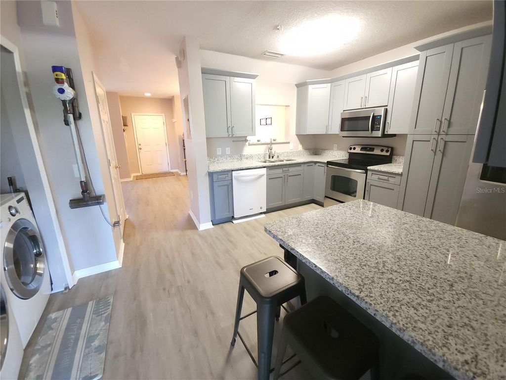 Photo of 1211 Haddington Way, Wesley Chapel, FL 33543 (MLS # TB8444277)