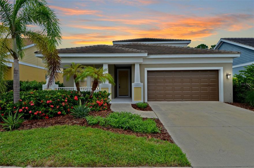 One or more photo(s) has been virtually staged. HOT NEW PRICE!! Beautiful Large Home With Private Setting! Step into this thoughtfully designed 2,438 square foot home located in the desirable Windwood Community. With 3 bedrooms plus a den, 2.5 bathrooms, and a 2-car garage, this home offers the perfect balance of comfort and functionality. The open floor plan makes a strong first impression, connecting the kitchen, dining, and living areas seamlessly. The kitchen is a true highlight with stainless steel appliances, a large walk-in pantry, granite countertops, and a substantial island that doubles as a gathering spot. White cabinetry offers plenty of storage, and modern pendant lighting adds a warm touch to the space. The living area is filled with natural light from the large windows and sliding glass doors that lead to the covered lanai. The front porch and lanai expand your living space outdoors, offering plenty of room for relaxing or entertaining. Neutral tile floors throughout the main living spaces provide both style and easy maintenance. The primary suite is spacious and private, with direct access to the backyard through sliding doors. The ensuite bath features a glass-enclosed shower, dual sinks, and a separate water closet. Two additional bedrooms, a den, and another full bath provide flexibility for your needs. Outside, you’ll find a well-maintained fenced yard bordered with lush greenery and palm trees, offering both privacy and space for outdoor enjoyment. The landscaped front entry and covered patio add to the home’s welcoming curb appeal. Additional highlights include a laundry room, high ceilings, freshly painted interior and exterior, storage closet underneath stairs, half bath for guests, common area for upstairs bedrooms, and a fenced backyard with preserve view. The home’s layout and inviting design make it a standout in Windwood. Located less than a mile from Sarasota Memorial Hospital (SMH) Venice campus, Publix shopping center, and minutes from I-75, this home offers both convenience and comfort. This home is also in close proximity to multiple golf courses, parks, schools, shopping, restaurants, Venice Island and Historic Downtown Venice, and multiple Gulf beaches. Don’t miss the opportunity to see how this home brings together open-concept living, modern finishes, and comfortable spaces inside and out!