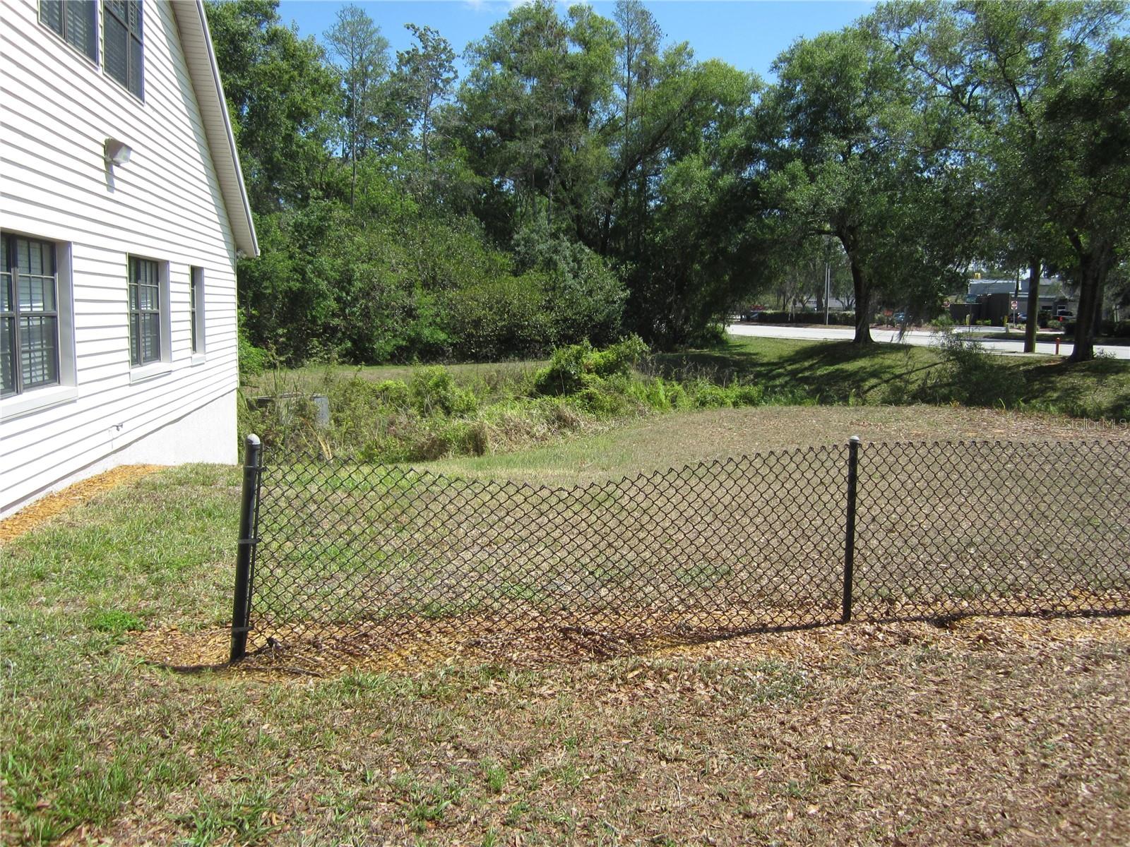 Vacant commercial lot in Crystal Lakes Professional Center. Lot is zoned PD plan development; 50x50; community has several 1-story office buildings; great location to build an office building. Needs fill dirt.