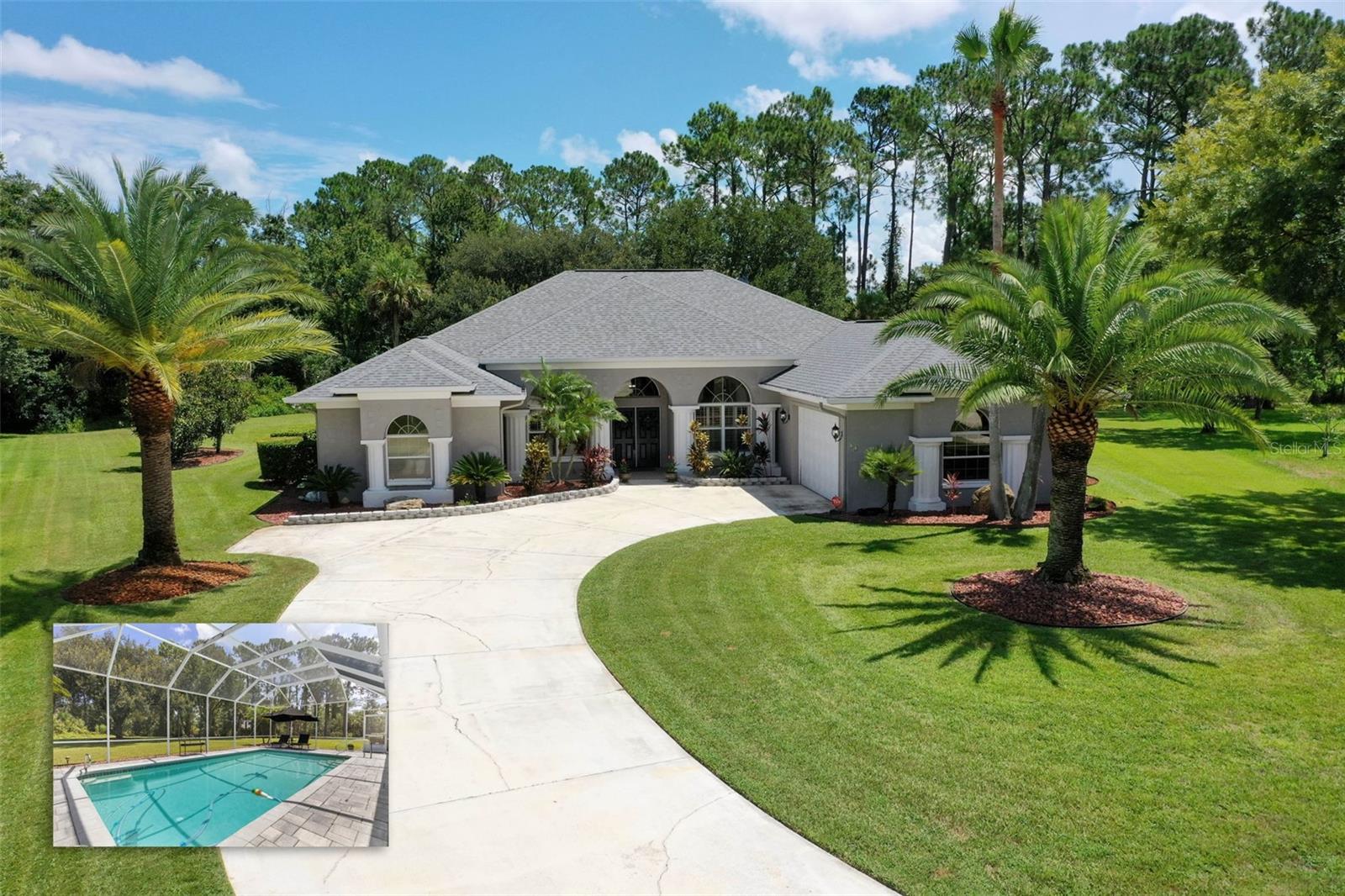 Spacious 5-Bedroom, 3-Bath Pool Home on Nearly an Acre in Prestigious Lake View
This remarkable residence offers the perfect blend of privacy, luxury, and location. Tucked away at the end of a quiet cul-de-sac on nearly an acre, it’s bordered by a freshwater canal and a conservation area—creating peaceful surroundings and lasting privacy. The unique Lake View community adds to the appeal with underground utilities, sidewalks, and streetlights for a refined neighborhood setting.
A long driveway leads to the side-entry courtyard garage, setting the tone for the elegance inside. Step through the front door into oversized, light-filled rooms with soaring ceilings and timeless architectural details throughout.
The remodeled gourmet kitchen is a true centerpiece, featuring quartz countertops, stainless steel appliances, a large center island with breakfast bar seating and storage, 42-inch cabinetry with custom pull-outs including a spice rack and trash drawer, a hidden walk-in pantry, plus an additional built-in pantry beside the fridge. A charming, custom-built eat-in nook with storage overlooks the pool, blending function and style.
With 5 bedrooms plus a versatile bonus room with a built-in electric fireplace, ideal as a media room—and 3 full baths, this home offers flexible living for family, guests, or office space. The primary suite is a private retreat with a tray ceiling, large walk-in closet, and French doors that open directly to the pool. The spa-like en-suite bath boasts dual vanities, a soaking tub, and a separate shower.
The outdoor living space is equally impressive, with a massive screened enclosure showcasing a sparkling pool, newer paved deck, TV with built-in speaker system, and a 640 sq ft covered lanai for year-round enjoyment. The expansive backyard offers endless opportunities for entertaining, relaxing, and enjoying the serene views.
Additional highlights include a newer roof (2019), newer exterior paint, front door, and oversized garage.
With its spacious design, high-end finishes, and unmatched privacy, this Lake View residence is truly one of a kind. Schedule your private showing today!