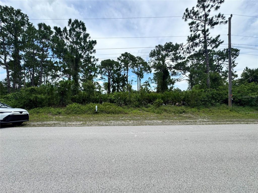 Photo of 977 Kellogg Street E, Lehigh Acres, FL 33974 (MLS # TB8403611)