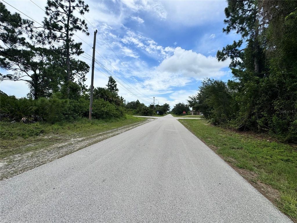 Photo of 977 Kellogg Street E, Lehigh Acres, FL 33974 (MLS # TB8403611)