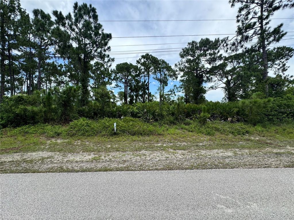 Photo of 977 Kellogg Street E, Lehigh Acres, FL 33974 (MLS # TB8403611)