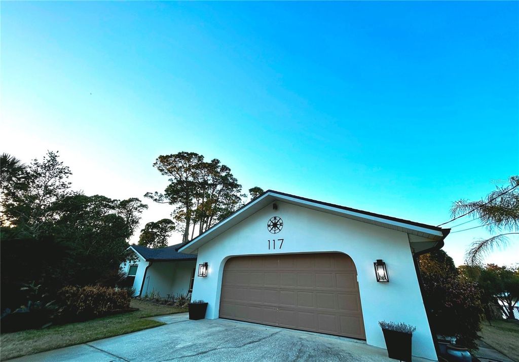 Photo of 117 Azalea Road, Edgewater, FL 32141 (MLS # NS1087360)