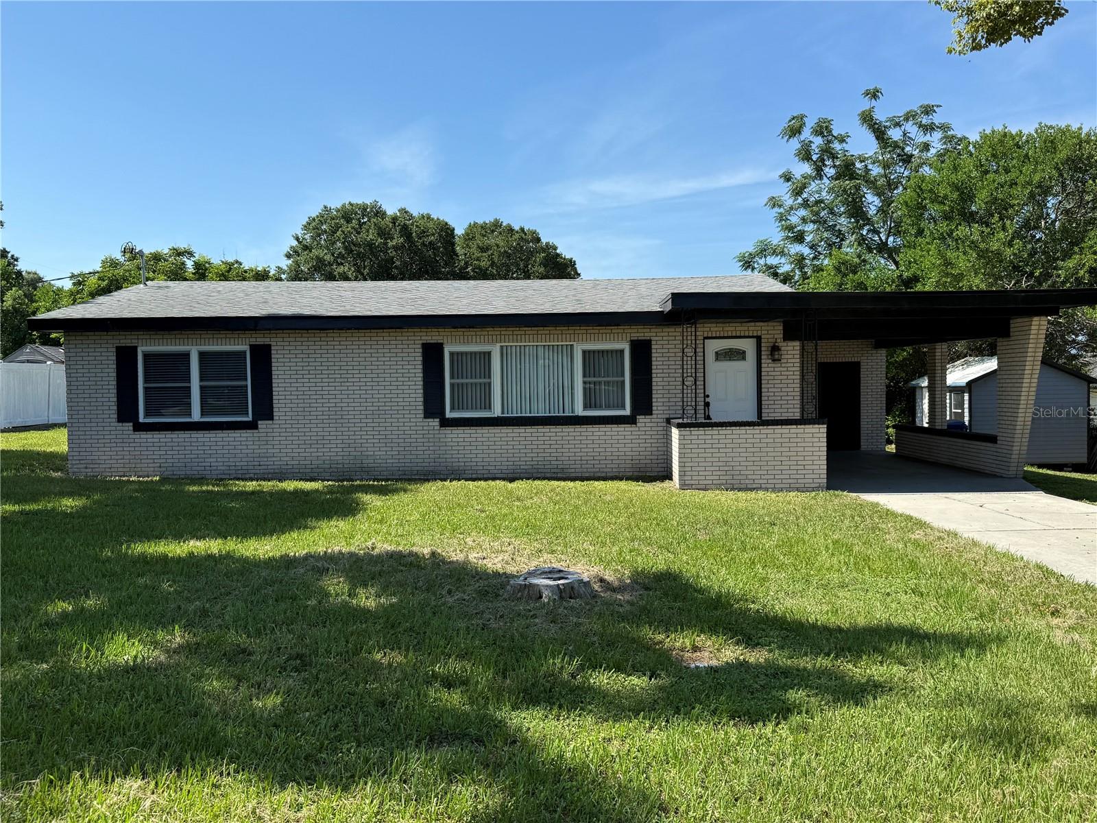 Welcome Home! This updated 2-bedroom, 1-bath brick home is perfect for a first-time buyer! Sitting on almost a quarter-acre in a non-flood zone, this home offers peace of mind and plenty of outdoor space to enjoy.
Inside, you’ll find fresh updates throughout, including new flooring, an updated bathroom, and a bright kitchen with modern touches. The open layout makes the home feel spacious and comfortable, while large windows bring in plenty of natural light.
The property includes a covered carport, a newly installed drain field (2024) for the septic system, and a spacious backyard—great for pets, play, or future plans like a garden or shed.
Located on a quiet street with easy access to shopping, schools, and parks. This move-in-ready home is a fantastic opportunity for buyers looking for a solid home with updates already done.
Schedule your tour today—homes like this don’t last long!