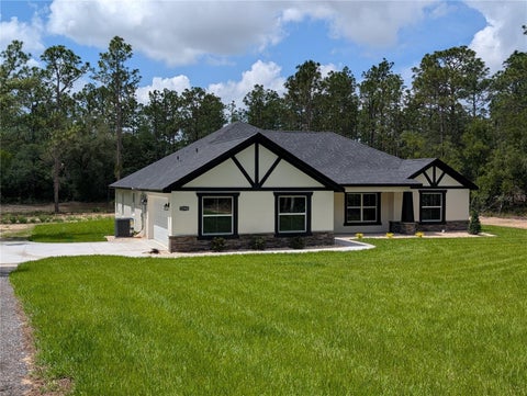 Photo of 12397 SW 76th Lane, Dunnellon, FL 34432 (MLS # OM725434)