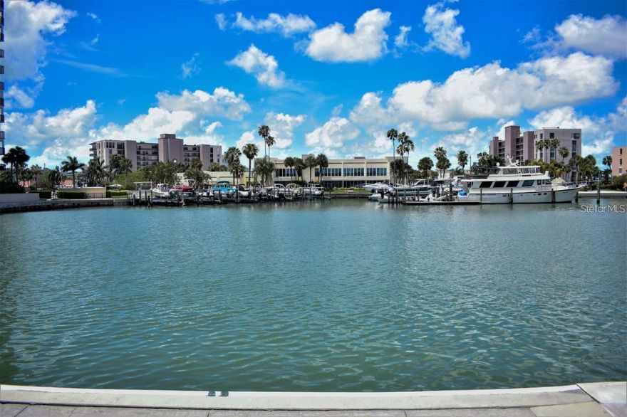 Welcome to Bay Island, a guarded, gated 55+ waterfront community. This one bedroom, one bath condo has been tastefully updated and the private porch is only steps away from the water. This complex has 6 pools, jacuzzis, 4 tennis courts, pickleball courts, barbeque grills, a clubhouse, a library, gyms, a community and card playing room. Available beginning May 2026. Association approval is required and takes 10 business days. One small pet is allowed.