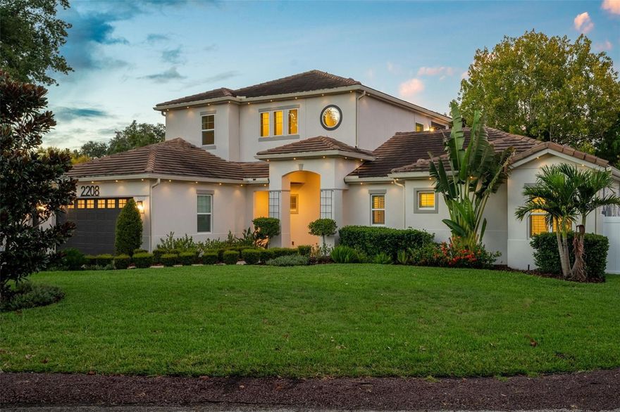 This stunning Lake Brantley estate combines timeless design, cutting-edge systems, and a thoughtful layout ideal for both everyday living and entertaining. Built by Dakota Homes on nearly half an acre with 106 feet of private canal frontage, the residence offers seamless access to Lake Brantley, one of Central Florida’s most desirable private ski lakes.

Inside, every detail reflects quality and craftsmanship. The home features two primary suites, one on the main level with spa-inspired bath and patio access, and a second upstairs with its own covered balcony and expansive rooftop terrace overlooking the water. The chef’s kitchen showcases solid maple cabinetry, GE Café appliances, granite countertops, and a large island that flows naturally into the open-concept living and dining areas.

Upgraded systems include a Generac whole-house generator with 500-gallon buried propane tank, a private well with advanced filtration and softening, dual HVAC systems, and a natural gas tankless water heater. Thoughtful enhancements like motorized screens and shades, Closets by Design storage, and integrated smart home controls add modern convenience.

Outdoor living shines with a resort-style pool and spa, travertine pavers, tropical landscaping, and permanent Gemstone LED lighting. The built-in outdoor kitchen, lighted patio, and upper-level terrace provide endless space to unwind or entertain.

Zoned for top-rated Seminole County schools and minutes from Winter Park, Maitland, and Downtown Orlando, this property offers the perfect blend of privacy, luxury, and lakeside lifestyle.