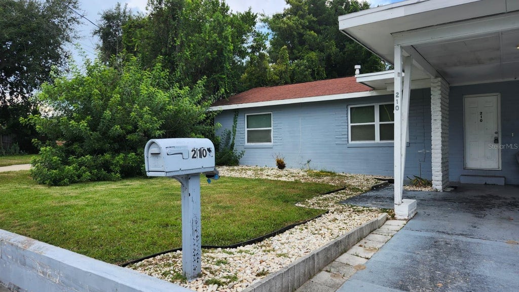 Photo of 210 Francis Parkman Place, Daytona Beach, FL 32114 (MLS # O6437342)
