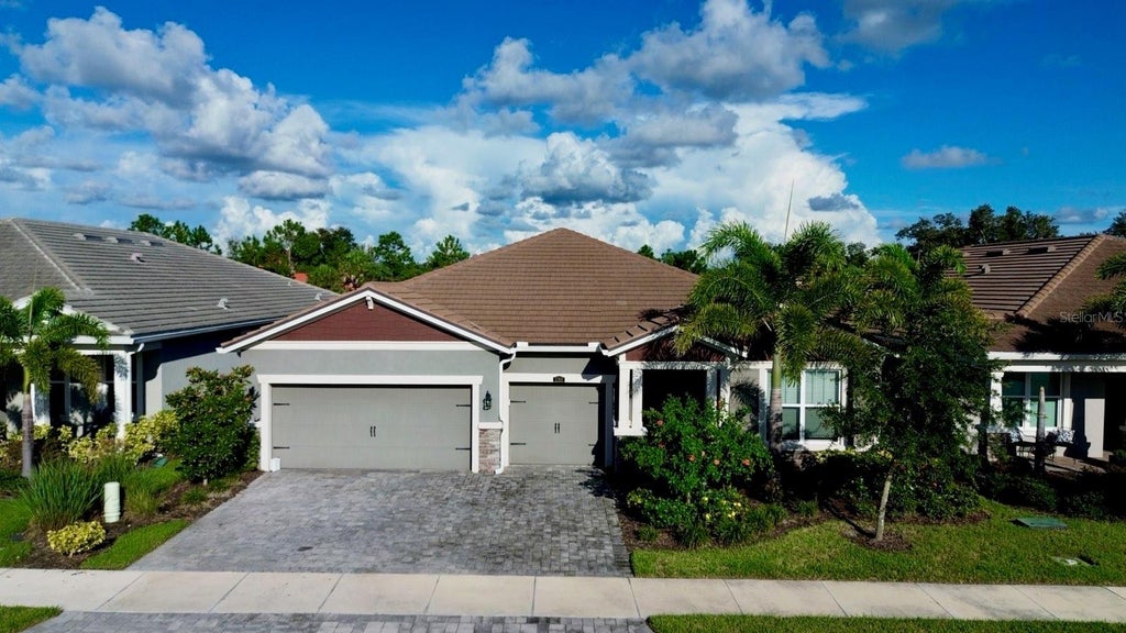 Photo of 5769 Long Shore Loop, Sarasota, FL 34238 (MLS # A4705755)