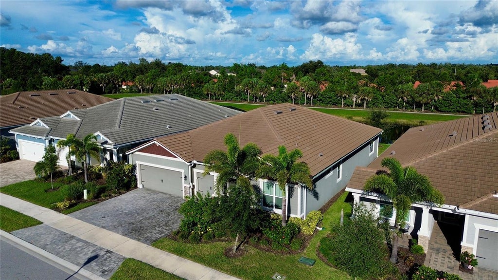 Photo of 5769 Long Shore Loop, Sarasota, FL 34238 (MLS # A4705755)