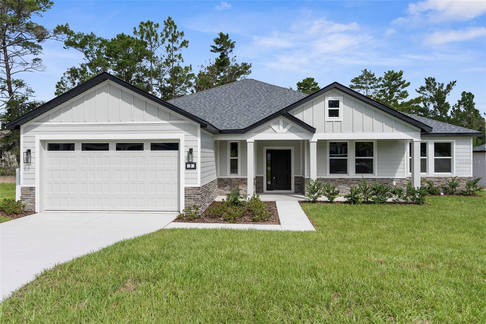 STUNNING, MOVE-IN READY...BRAND NEW HOME!!! Craftsman-style Luxury Home in the beautiful golf community of Sugarmill Woods on a 1/4 acre lot with NO REAR NEIGHBORS!! 4 bed + 2 full bathe + guest half bath + 2 car garage + the Builder's Signature Mudroom and Laundry Room (WOW) + SPA-LIKE master ensuite bathroom (WOW) + covered front porch + covered back lanai + landscaped + sprinkler system + 2,131 sq ft living space; 2,839 total + Builder's 2-10 Warranty + PAVED ROAD + NO FLOOD!! NO CDD FEE!! HOA-OWNED LAND behind you, so no rear neighbors to look at and to look at you!!!! **** This mudroom, laundry room, and pantry area...is the "drop center" for the home and is a must see!! ****
Relax and enjoy your coffee in the mornings on your inviting front porch! Large covered back porch for grilling out and enjoying your backyard!! This is a block home...but it doesn't stop there...the builder added board and batten on the front exterior of the home with stacked stone accents...this all adds to its craftsman-style appeal!! This is NOT your standard basic tract home/builder - this builder pays attention to every detail and everything is upgraded!!
The entryway & front door welcomes you and your guests into the grand center of the home with a large open great room, island-style kitchen and dining room all with 10' tray ceilings! The high ceilings, large glass sliders and open floor plan makes this home feel spacious, light, bright, and cheery...where your family can gather; great for entertaining family and friends!!
Designer faucets, lighting, and ceiling fans, upgraded baseboards, upgraded windows/sliders, Luxury Vinyl Plank flooring throughout the entire home (no carpet), designer backsplash, stainless steel upgraded appliances (Refrigerator INCLUDED), and stainless steel range hood! The upgraded kitchen offers stunning QUARTZ countertops with the modern large, single-level island with breakfast bar big enough for the whole family! Real wood upgraded 42'' soft-close cabinets with a stunning backsplash for that finished luxury look and feel. New stainless steel appliances! LARGE WALK-IN PANTRY!
The home has a split floor plan offering privacy to the owner's suite with a large ensuite bathroom! The ensuite bathroom is a SPA RETREAT in itself with a large stand-alone, modern soaking tub, separate over-sized, floor-to-ceiling tiled walk-in shower and designer shower head and frameless glass door, granite vanity with dual sinks, matching real wood upgraded cabinets with extra storage cabinetry, framed mirrors, designer faucets and lighting, and a separate toilet room for privacy! There is a half bath off the great room for your guests!
This is no ordinary second bathroom!! This has dual granite VANITIES and dual sinks...and the toilet and shower are separate, so family members can still use the vanity area while another is showering. GREAT DESIGN! Multi-zoned sprinkler system & landscaping! Public water and sewer.
Built by LDT CONSTRUCTION. Other spec homes available; call for details. Minutes from shopping, restaurants, movies, schools, Buccaneer Bay Water Park, kayaking the crystal clear Weeki Wachee River, sunsets at Pine Island, boating, fishing, swimming w/the manatees. 1 hr to Tampa & TOP US BEACHES!