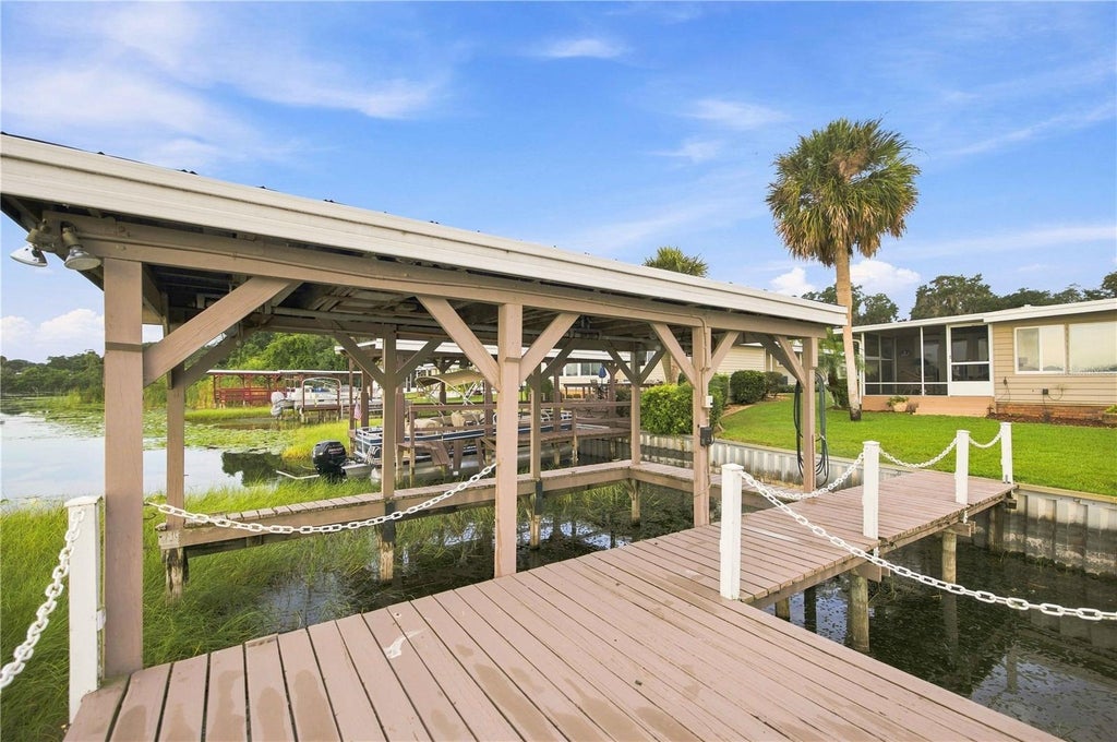 Photo of 15 Sunrise Trail, Fruitland Park, FL 34731 (MLS # OM731275)