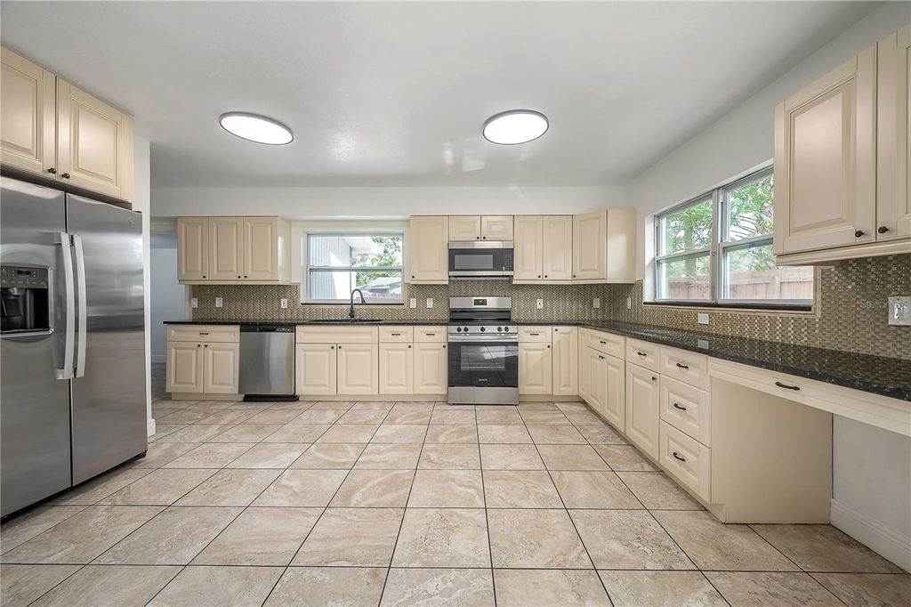 Photo of 807 W Virginia Avenue, Tampa, FL 33603 (MLS # TB8428554)