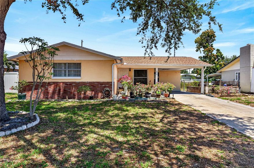 Welcome to 8845 55th Way N, a well-loved solid block home ready for its next chapter. Lovingly cared for by the same owner for nearly 50 years, this 3-bedroom, 1.5-bathroom property offers an incredible opportunity for a buyer looking to personalize a quality-built home in the heart of Pinellas Park.

Step inside through the covered front entry into the spacious living room, then continue through to the dining area where sliding glass doors overlook the covered patio, creating an easy indoor/outdoor flow perfect for entertaining or relaxing evenings at home. The kitchen is tucked toward the rear of the home and features a convenient utility room just off the kitchen, along with access to the attached carport.

All three bedrooms are located on the north side of the home, including a primary bedroom with its own private half bath. The hall bathroom features a tub/shower combination and serves the additional bedrooms.

Many of the major updates have already been completed, including a brand-new roof installed in March 2026, HVAC system from 2019, and water heater from 2020, allowing the next owner to focus on cosmetic updates and personalization over time.

Located near popular community spots like Skyview Pool, England Brothers Park, and Helen Howarth Park, this home offers convenient access to recreation, community events, playgrounds, walking trails, and outdoor activities. With solid block construction, a functional layout, and strong major systems already in place, this property presents an excellent opportunity to create equity and make the home your own.