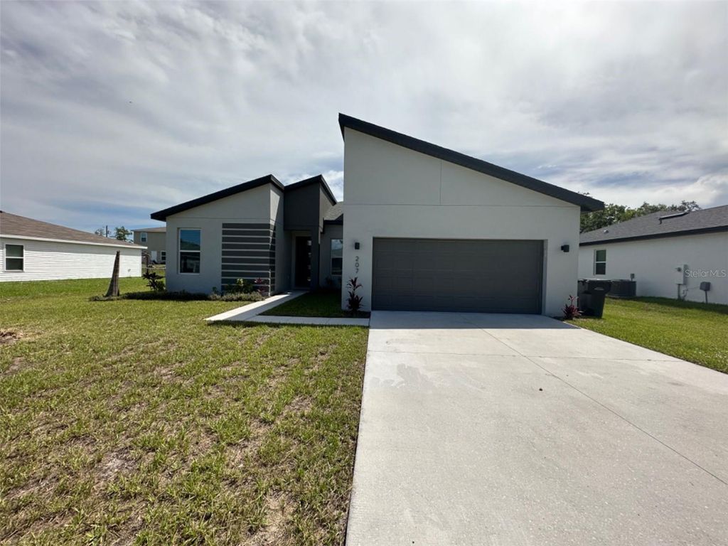 Photo of 207 Begonia Lane, Poinciana, FL 34759 (MLS # S5147428)