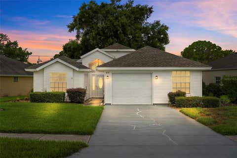 Photo of 615 Juniper Way, Tavares, FL 32778 (MLS # O6424740)