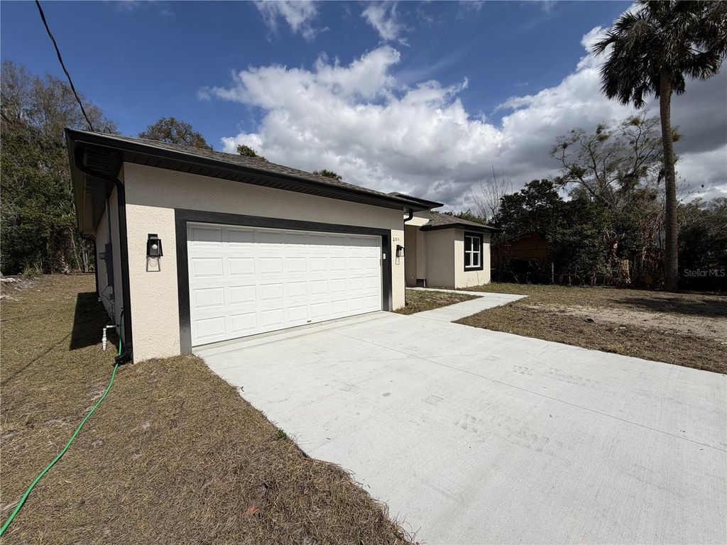 Photo of 221 W Euclid Avenue, Deland, FL 32720 (MLS # V4944347)