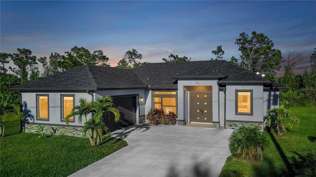 Photo of 24 Medalist Circle, Rotonda West, FL 33947 (MLS # A4663416)