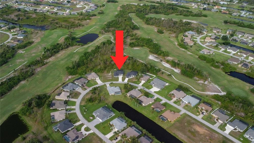 Photo of 24 Medalist Circle, Rotonda West, FL 33947 (MLS # A4663416)