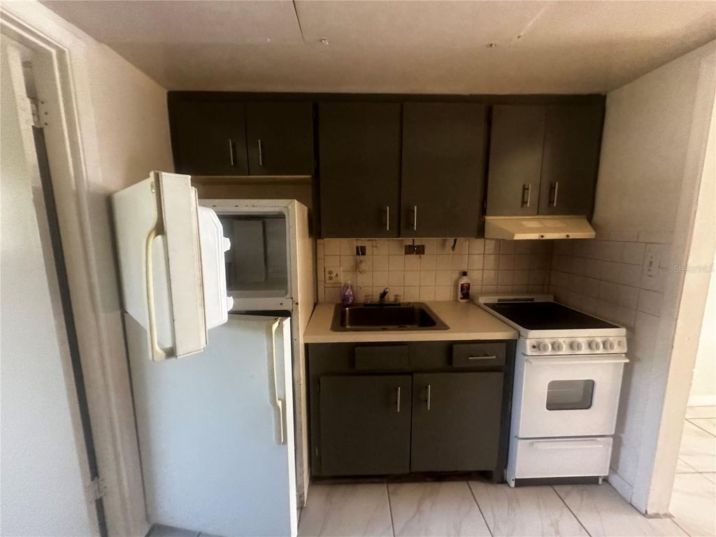 Photo of 1315 SE Silver Springs Place #4, Ocala, FL 34471 (MLS # OM718094)