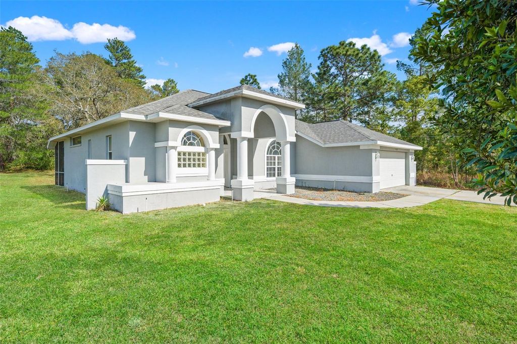 Photo of 11128 Lomita Wren Road, Weeki Wachee, FL 34614 (MLS # W7884510)