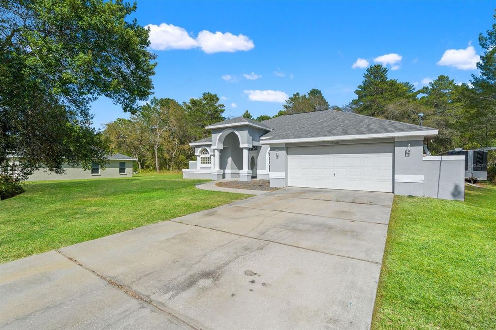 Photo of 11128 Lomita Wren Road, Weeki Wachee, FL 34614 (MLS # W7884510)