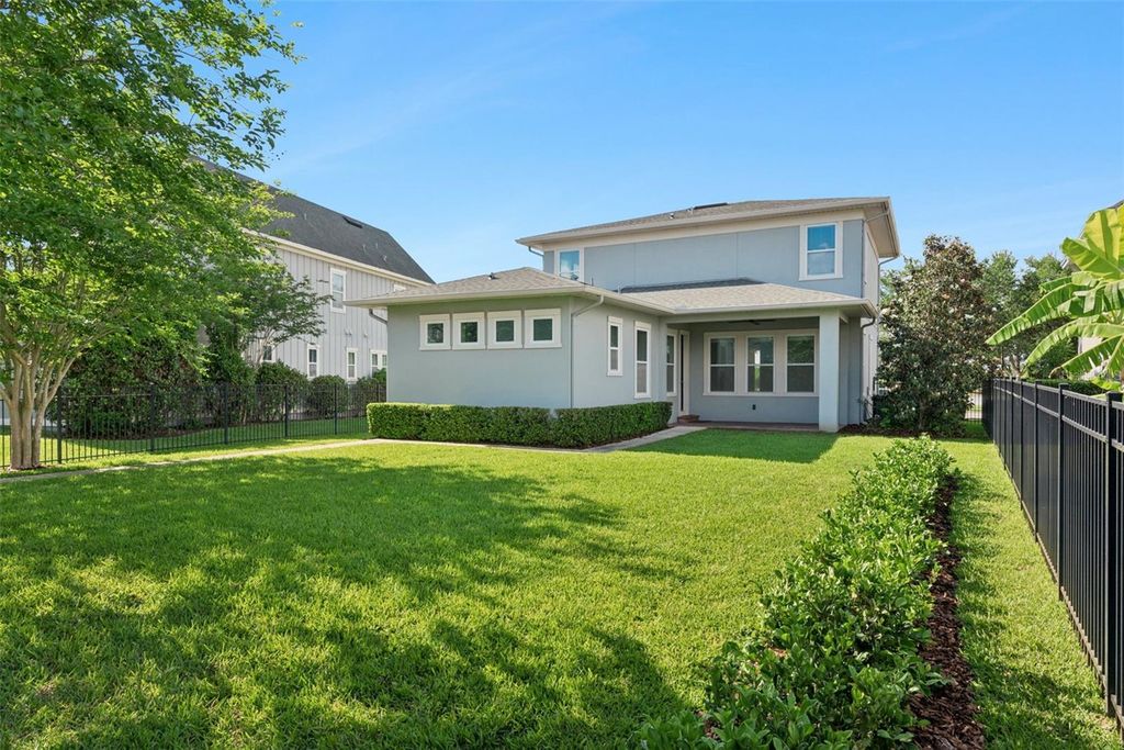 Photo of 9044 Tavistock Lakes Boulevard, Orlando, FL 32827 (MLS # O6402945)