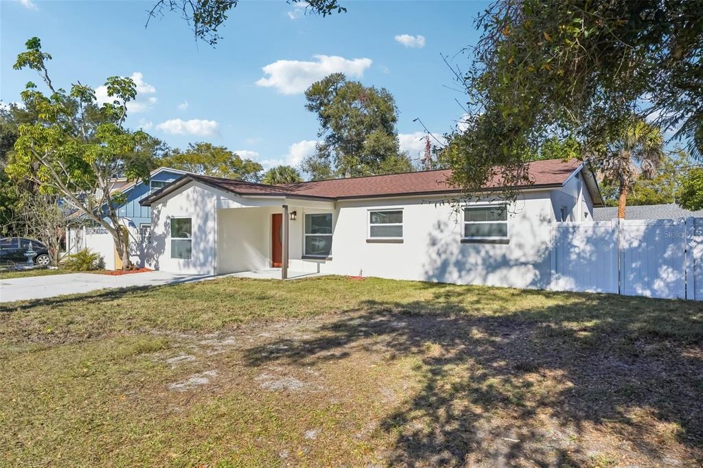 Photo of 9061 Sunrise Drive, Largo, FL 33773 (MLS # TB8466442)