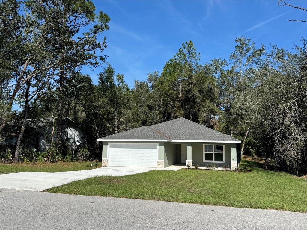 Photo of 19447 SW 98th Place Road, Dunnellon, FL 34432 (MLS # OM710952)