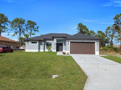 Photo of 3414 4th Street SW, Lehigh Acres, FL 33976 (MLS # A4674299)